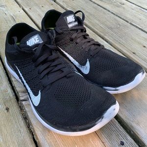 Black Nike running shoes
